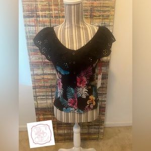 NWT Justice tank 12/14 (girls) 
Would fit size small women.